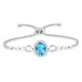 10x8 MM Oval Shape Blue Topaz and 1/20 Ctw Round shape Diamond Sterling Silver Lariat Bracelet