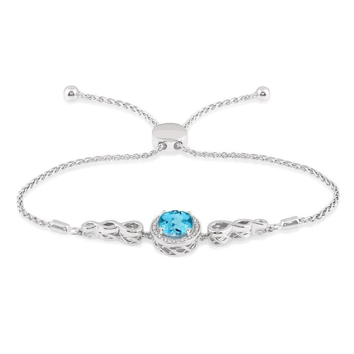 10x8 MM Oval Shape Blue Topaz and 1/20 Ctw Round shape Diamond Sterling Silver Lariat Bracelet