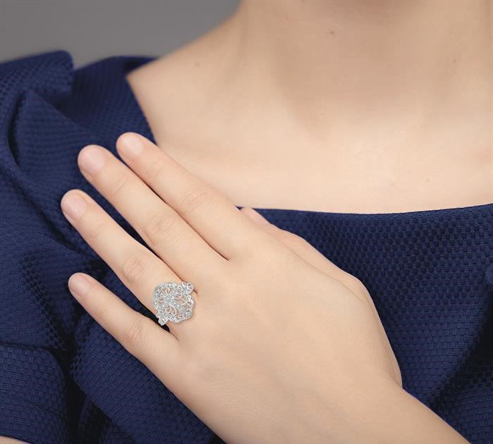 1/20 Ctw Round Cut Diamond Cross In Oval Ring in Sterling Silver
