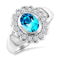 8X6 MM Oval Cut Blue Topaz and 1.9 MM Round Cut White Topaz Semi-Precious Bold Ring in Sterling Silver