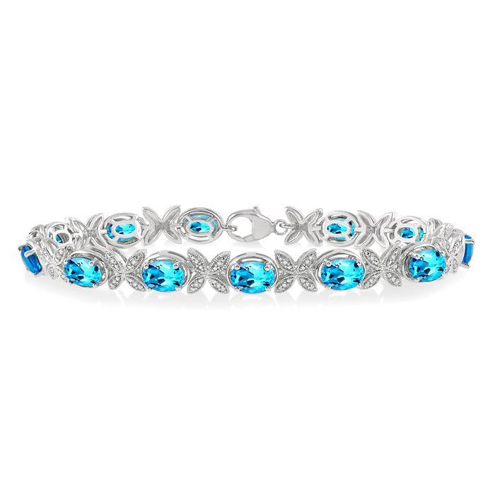 Silver Oval Shape Blue Topaz Gemstone & 1/10CTW Diamond Bracelet