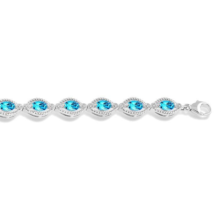 6x4 MM Oval Cut Blue Topaz and 1/10 Ctw Round Cut Diamond Semi-Precious Bracelet in Sterling Silver