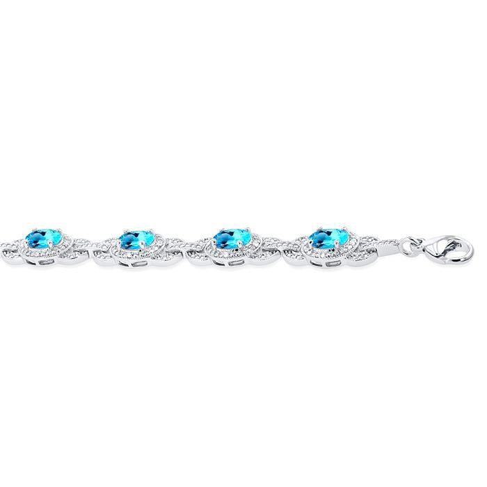Oval Shape Blue Topaz and 1/10 Ctw Round Cut Diamond Semi-Precious Bracelet