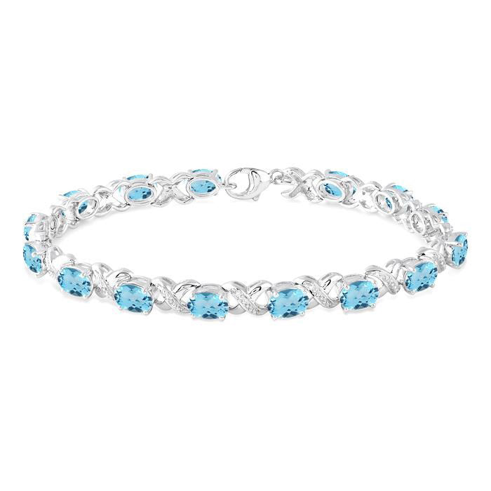 Silver Oval Shape Blue Topaz Gemstone & 1/20CTW Diamond Bracelet