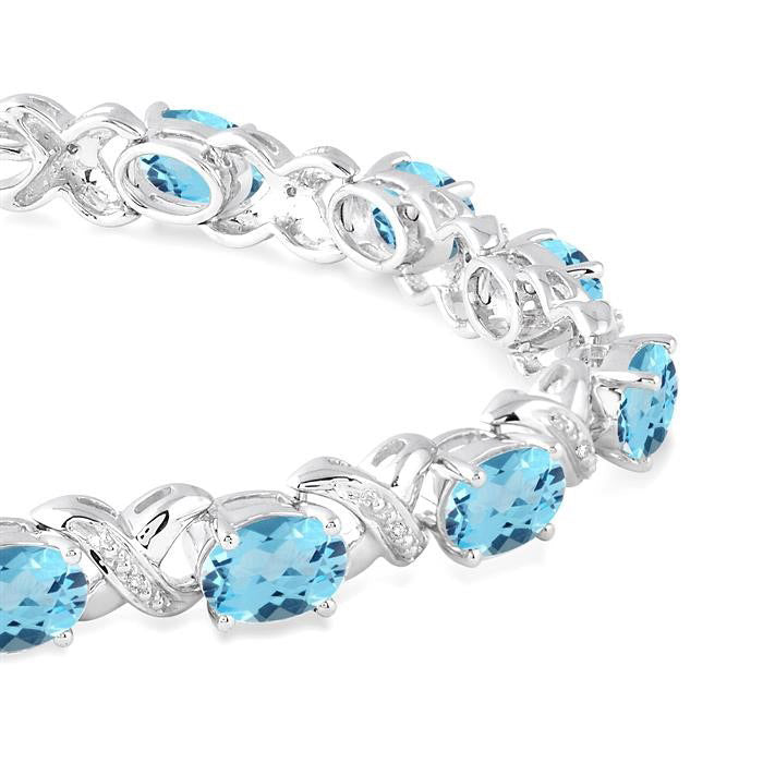 Silver Oval Shape Blue Topaz Gemstone & 1/20CTW Diamond Bracelet