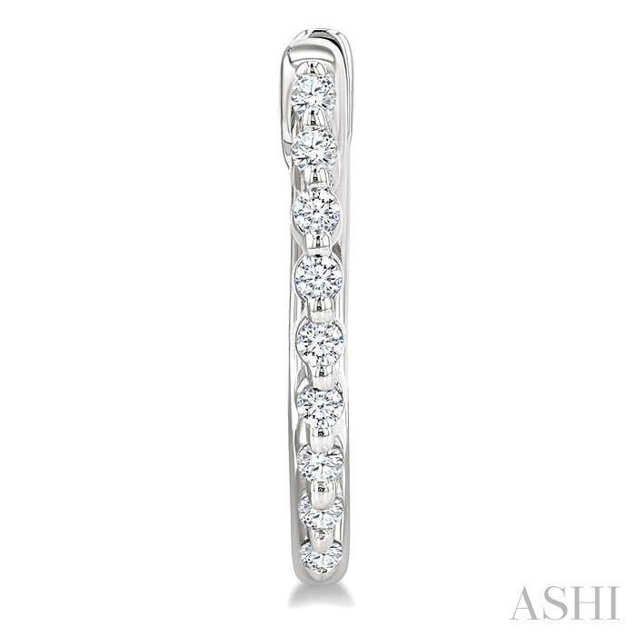 1/6 Ctw Petite Shared Prong Round Cut Diamond Hoop Earrings in Sterling Silver