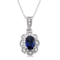 6x4 MM Oval Cut Sapphire and 1/20 Ctw Round Cut Diamond Pendant in Sterling Silver with Chain