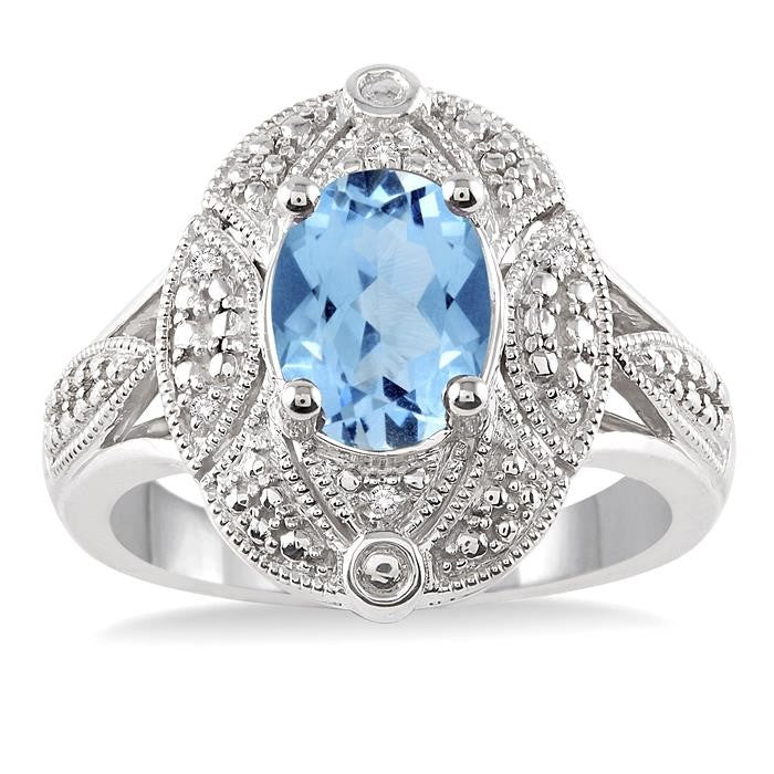 9x7 MM Oval Cut Blue Topaz and 1/50 Ctw Round Cut Diamond Ring in Sterling Silver