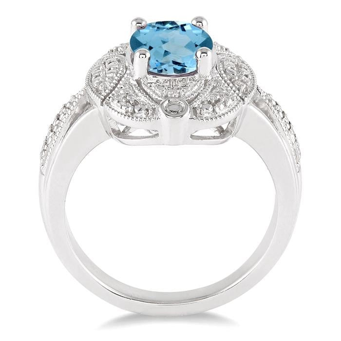 9x7 MM Oval Cut Blue Topaz and 1/50 Ctw Round Cut Diamond Ring in Sterling Silver