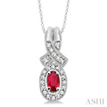 5x3 MM Oval Cut Ruby and 1/50 Ctw Round Cut Diamond Pendant in Sterling Silver with Chain