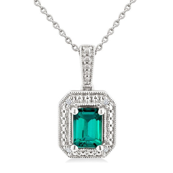 7X5 MM Octagon Shape Lab-Created Emerald and 1/50 Ctw Round Cut Diamond Precious Pendant With Chain in Sterling Silver