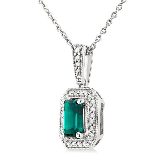 7X5 MM Octagon Shape Lab-Created Emerald and 1/50 Ctw Round Cut Diamond Precious Pendant With Chain in Sterling Silver