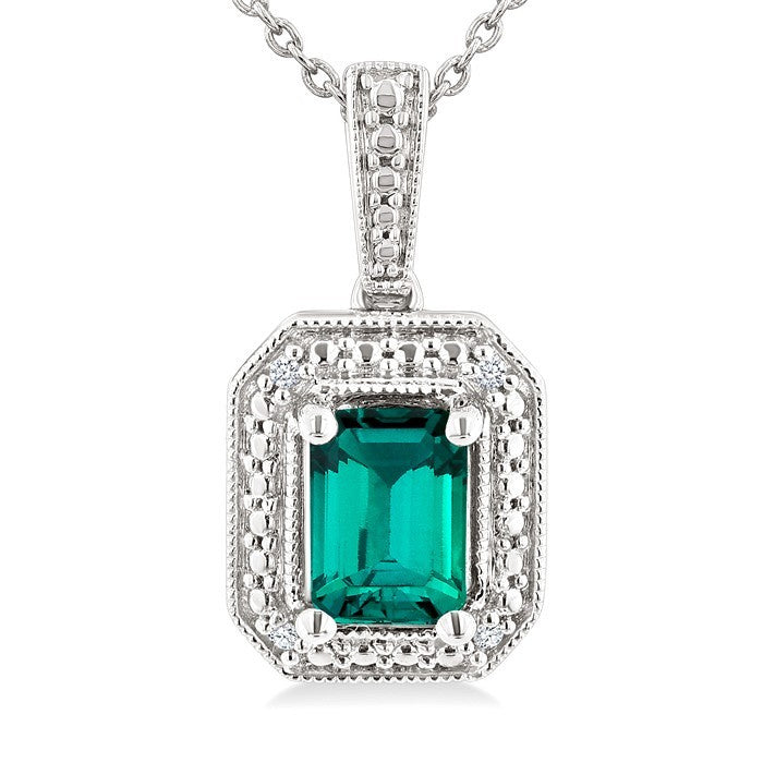 7X5 MM Octagon Shape Lab-Created Emerald and 1/50 Ctw Round Cut Diamond Precious Pendant With Chain in Sterling Silver
