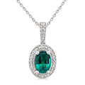 7X5 MM Oval Shape Lab-Created Emerald and 1/50 Ctw Round Cut Diamond Precious Pendant With Chain in Sterling Silver