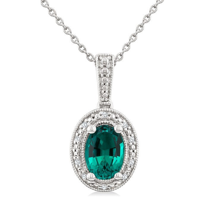 7X5 MM Oval Shape Lab-Created Emerald and 1/50 Ctw Round Cut Diamond Precious Pendant With Chain in Sterling Silver