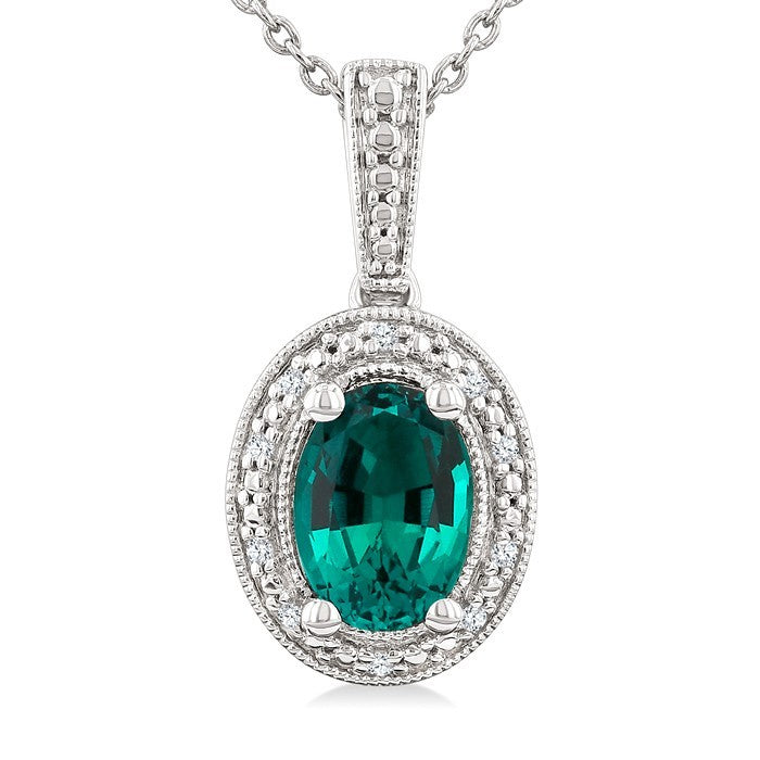 7X5 MM Oval Shape Lab-Created Emerald and 1/50 Ctw Round Cut Diamond Precious Pendant With Chain in Sterling Silver