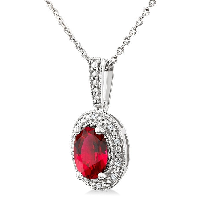 7X5 MM Oval Shape Lab-Created Ruby and 1/50 Ctw Round Cut Diamond Precious Pendant With Chain in Sterling Silver