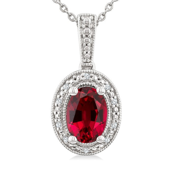 7X5 MM Oval Shape Lab-Created Ruby and 1/50 Ctw Round Cut Diamond Precious Pendant With Chain in Sterling Silver