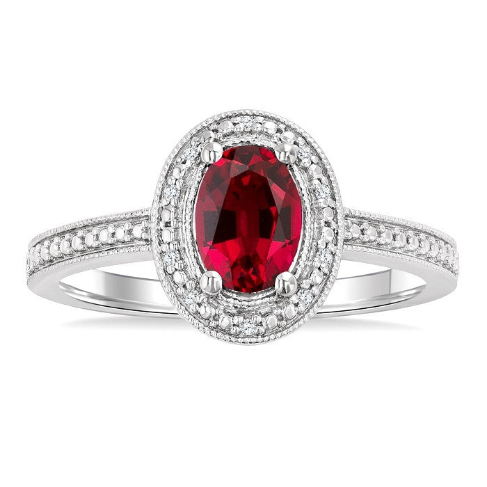 7X5 MM Oval Shape Lab-Created Ruby and 1/50 Ctw Round Cut Diamond Precious Ring in Sterling Silver