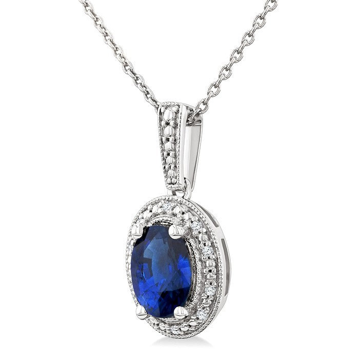 7X5 MM Oval Shape Lab-Created Sapphire and 1/50 Ctw Round Cut Diamond Precious Pendant With Chain in Sterling Silver