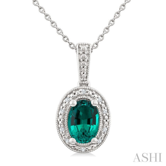7X5 MM Oval Shape Lab-Created Emerald and 1/50 Ctw Round Cut Diamond Precious Pendant With Chain in Sterling Silver