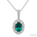 7X5 MM Oval Shape Lab-Created Emerald and 1/50 Ctw Round Cut Diamond Precious Pendant With Chain in Sterling Silver