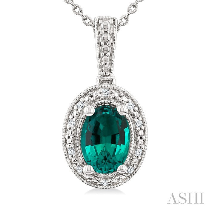 7X5 MM Oval Shape Lab-Created Emerald and 1/50 Ctw Round Cut Diamond Precious Pendant With Chain in Sterling Silver