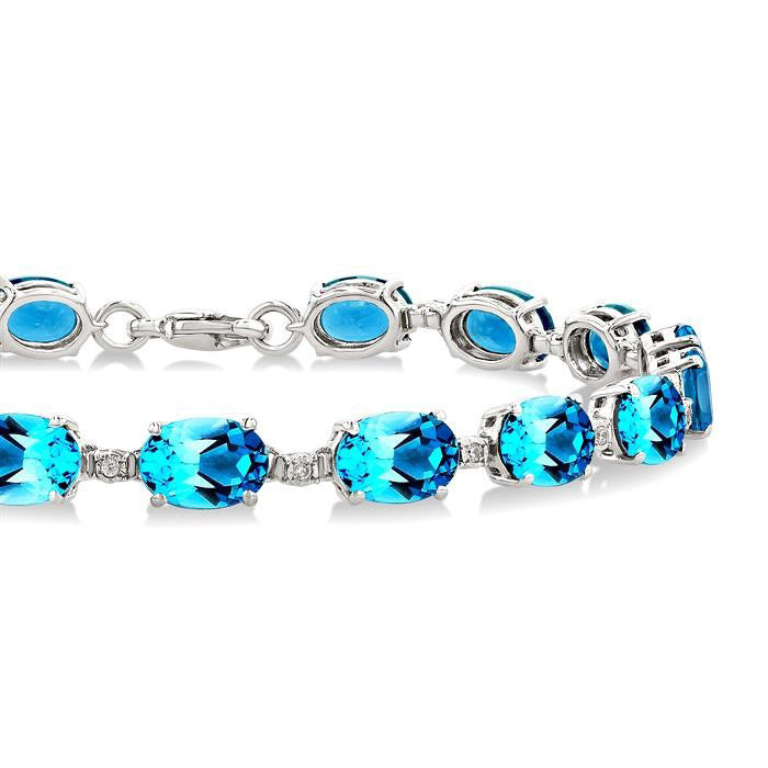 Sherri Silver Oval Shape Blue Topaz Gemstone & 1/10CTW Diamond Bracelet