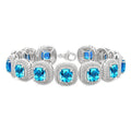 7 MM Oval Shape Blue Topaz and 1/10 Ctw Round Cut Diamond Semi-Precious Bracelet in Sterling Silver