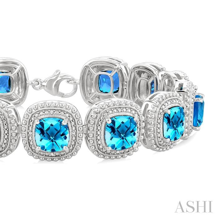 7 MM Oval Shape Blue Topaz and 1/10 Ctw Round Cut Diamond Semi-Precious Bracelet in Sterling Silver