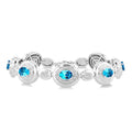 7X5 MM Oval Shape Blue Topaz and 1/10 Ctw Round Cut Diamond Bold Bracelet in Sterling Silver