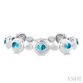 7X5 MM Oval Shape Blue Topaz and 1/10 Ctw Round Cut Diamond Bold Bracelet in Sterling Silver