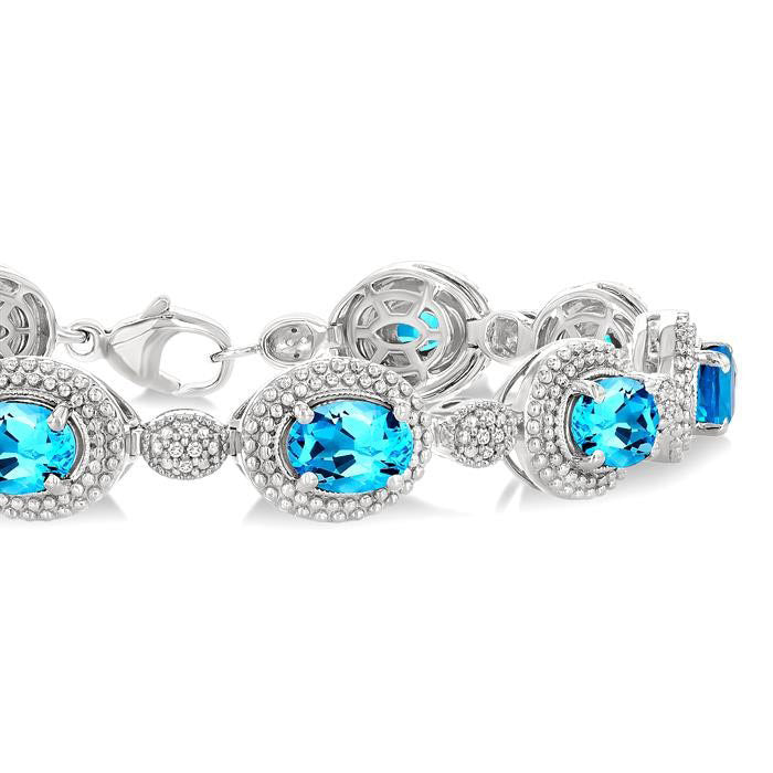 Nancy Silver Oval Blue Topaz Shape Gemstone & 1/10CTW Diamond Bracelet