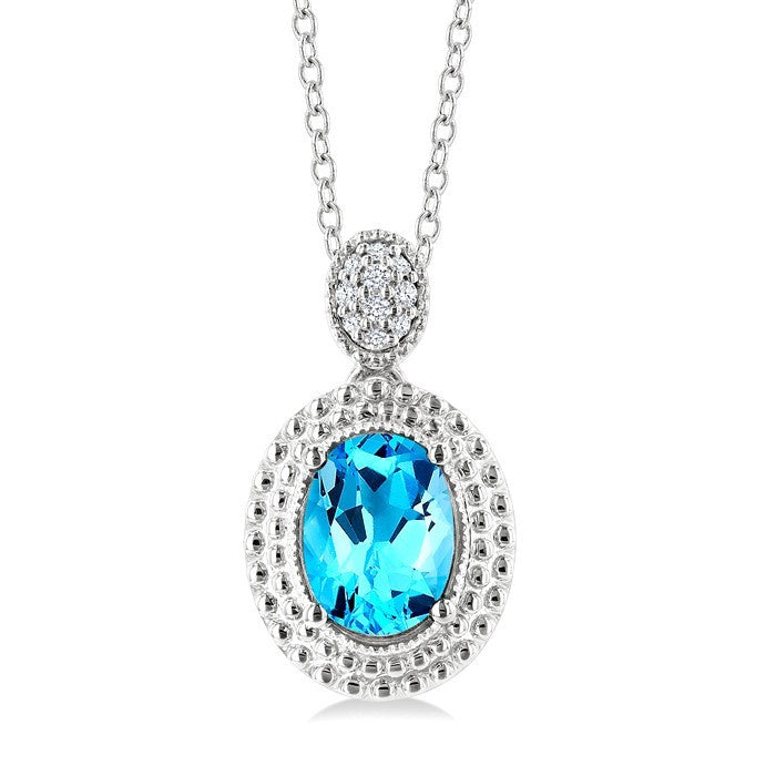 8X6 MM Oval Cut Blue Topaz and 1/20 Ctw Round Cut Diamond Semi-Precious Pendant With Chain in Sterling Silver