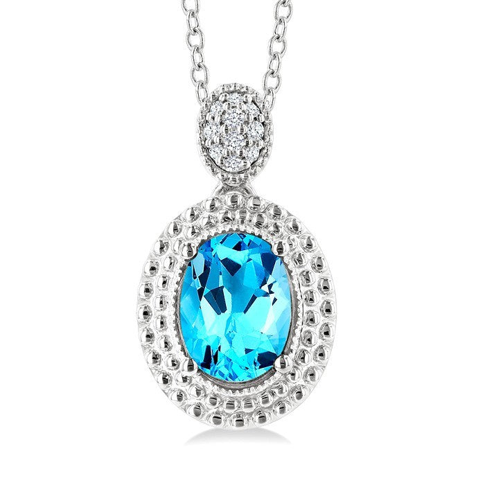 8X6 MM Oval Cut Blue Topaz and 1/20 Ctw Round Cut Diamond Semi-Precious Pendant With Chain in Sterling Silver