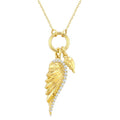 1/10 Ctw Pirouette Angle Wings Charm Fluted Round Cut Diamond Fashion Pendant With Chain in 10K Yellow Gold