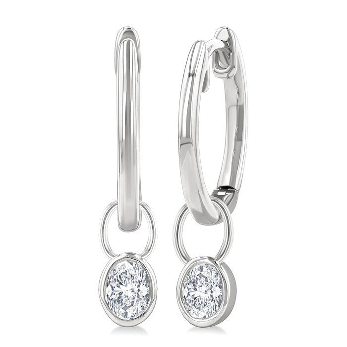 1/3 Ctw Bezel Set Oval Cut Diamond Huggie Earrings in 14K White Gold