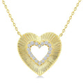 1/8 Ctw Round Cut Diamond Pirouette Heart Fashion Pendant With Chain in 10K Yellow Gold