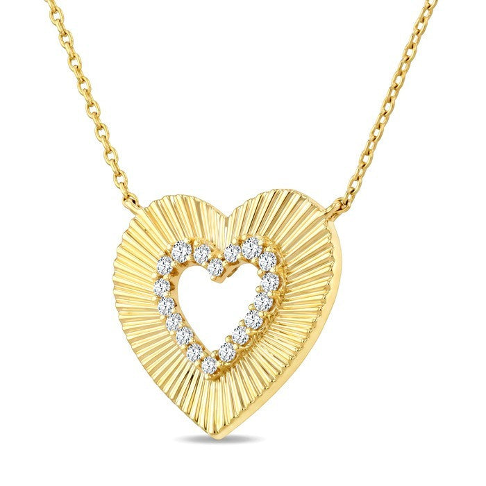 1/8 Ctw Round Cut Diamond Pirouette Heart Fashion Pendant With Chain in 10K Yellow Gold