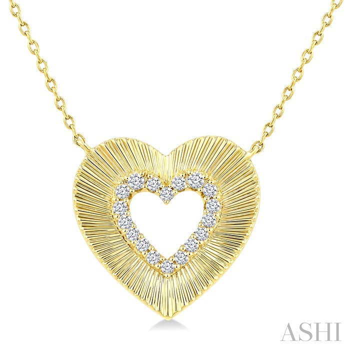 1/8 Ctw Round Cut Diamond Pirouette Heart Fashion Pendant With Chain in 10K Yellow Gold