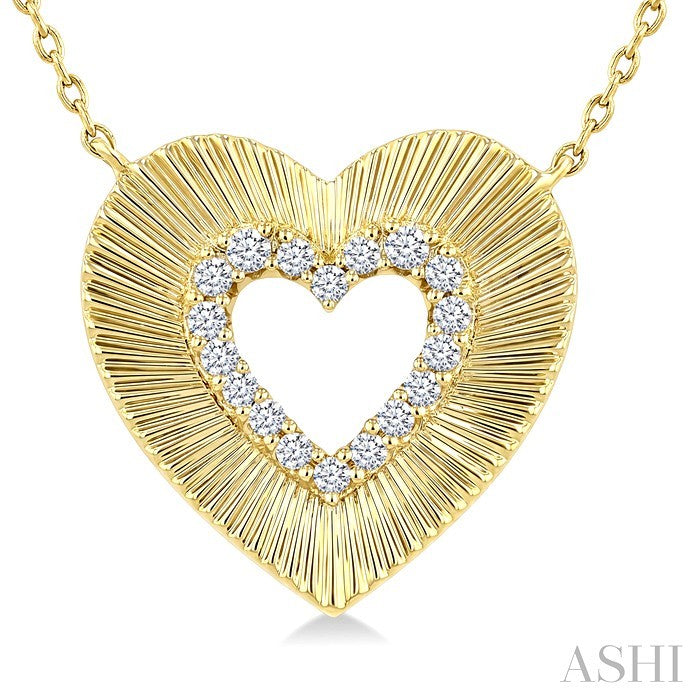 1/8 Ctw Round Cut Diamond Pirouette Heart Fashion Pendant With Chain in 10K Yellow Gold