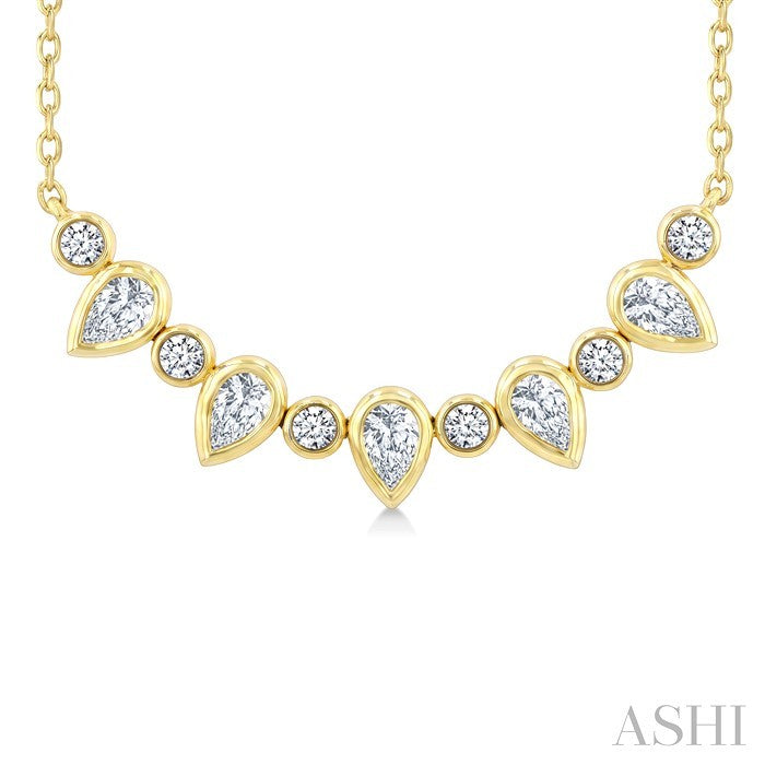 5/8 Ctw Bezel Set Pear and Round Cut Diamond Necklace in 14K Yellow Gold