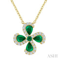 4x3 MM Pear Cut & 2 MM Round Cut Emerald and 1/6 Ctw Round Cut Diamond Floral Shape Pendant With Chain in 14K Yellow Gold