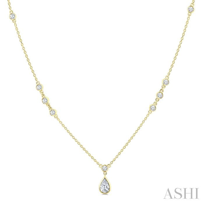 1/2 Ctw Bezel Set Pear and Round Cut Diamond Drop Necklace in 14K Yellow Gold
