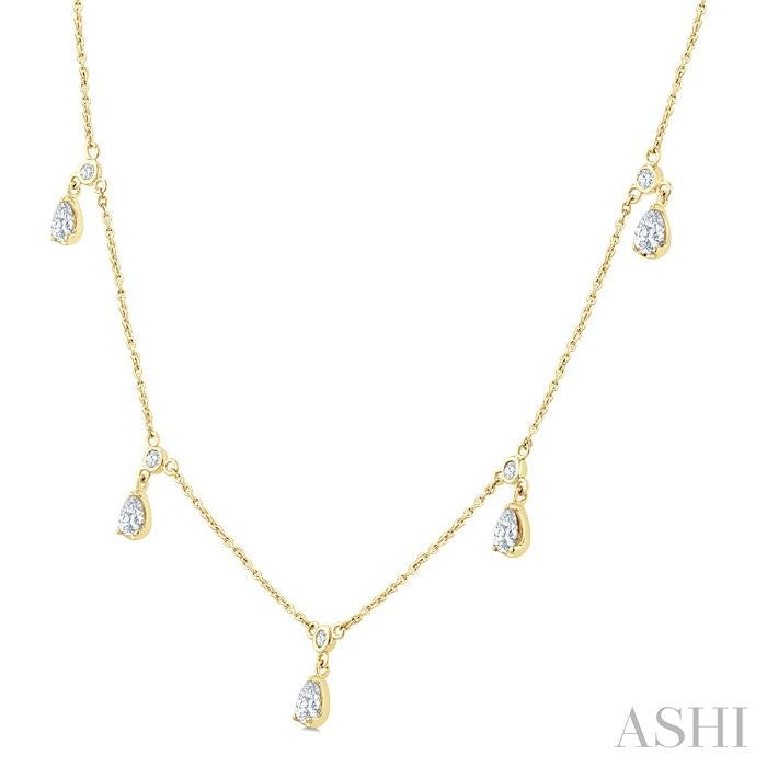 5/8 Ctw Dangle Pear and Round Cut Diamond Station Necklace in 14K Yellow Gold