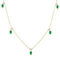 5x3 MM Oval Shape Emerald and 1/8 Ctw Round Cut Diamonds Precious Station Necklace in 10K Yellow Gold