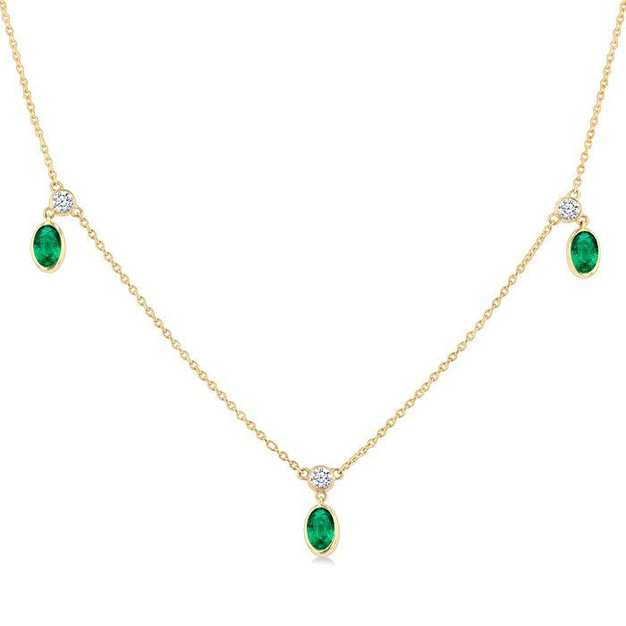 5x3 MM Oval Shape Emerald and 1/8 Ctw Round Cut Diamonds Precious Station Necklace in 10K Yellow Gold