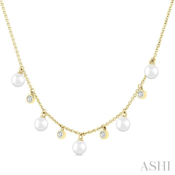 4 MM Cultured Pearl and 1/8 Ctw Round Cut Diamond Station Necklace in 10K Yellow Gold