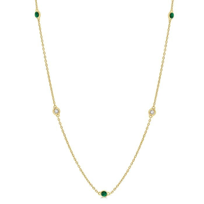1.75 MM Emerald and 1/6 Ctw Round Cut Diamond Precious Station Necklace in 14K Yellow Gold