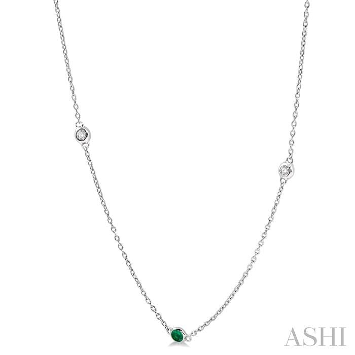 1.75 MM Emerald and 1/6 Ctw Round Cut Diamond Precious Station Necklace in 14K White Gold